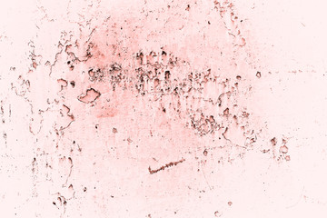 Vintage pink background. Rough painted wall of living coral color. Imperfect plane of beige colored. Uneven old decorative toned backdrop of beige tint. Texture of pink hue. Ornamental stony surface.