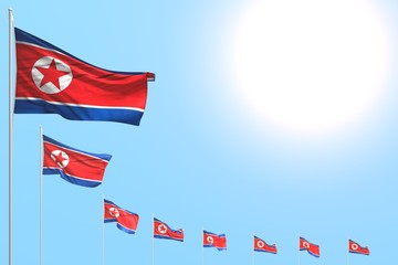 cute anthem day flag 3d illustration. - many North Korea flags placed diagonal on blue sky with space for your text