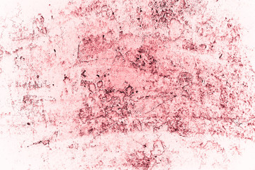 Vintage pink background. Rough painted wall of fiesta color. Imperfect plane of rosy colored. Uneven old decorative toned backdrop of rouge tint. Texture of pink hue. Ornamental stony surface.