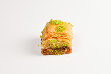 Pistachio baklava on a white background. Dessert.