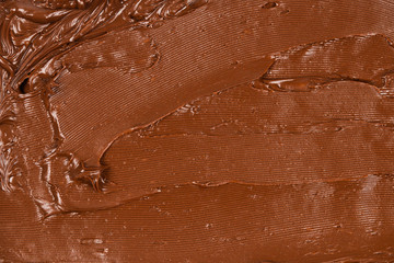 Chocolate cream background. Space for text or design.