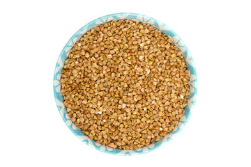 Dried brown buckwheat (Fagopvrum esculentum) isolated on a white background.Top view.