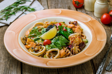 Salad with seafood on plate