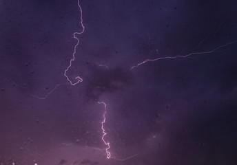 powerful lightning strikes over night sky 