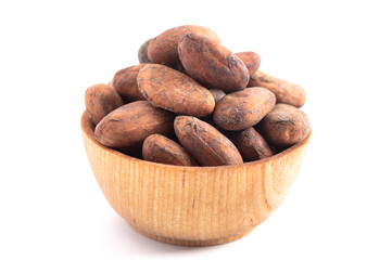 Obraz premium Bowl of Raw Cocoa Beans Isolated on a White Background