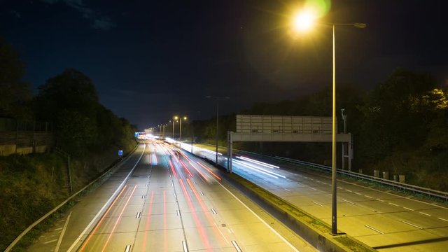 Time lapse night motion light trails on a busy freeway