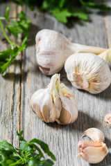 Garlic on a grey wooden table. Rustic style
