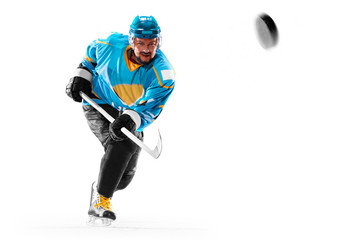 Obraz premium Professional ice hockey player in action on white backgound