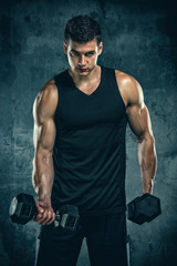 Fototapeta na wymiar Handsome Athletic Men Exercise With Weights