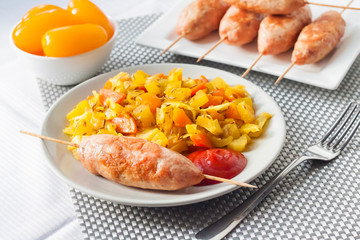 Stewed vegetables with turmeric and cumin and turkey kebab