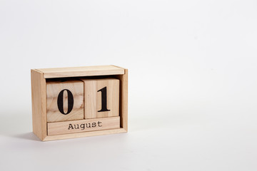 Wooden calendar August 01 on a white background