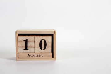 Wooden calendar August 10 on a white background