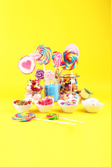 candies with jelly and sugar. colorful array of different childs sweets and treats.