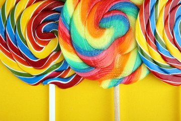 lolly candies with sugar. colorful array of childs lollipops sweets and treats with candy