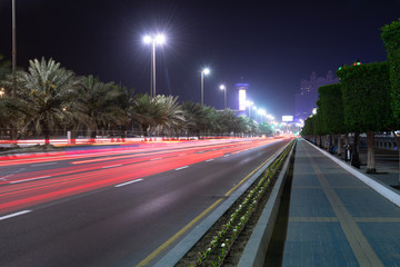 Fototapeta na wymiar The Night cityscape with road in Abu Dhabi, UAE