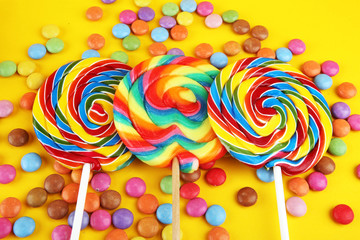 lolly candies with sugar. colorful array of childs lollipops sweets and treats with candy