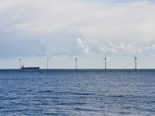 Offshore wind turbines on the coast of Copenhagen in Denmark 