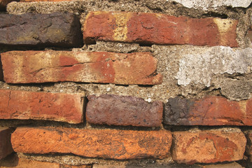 Wall brick old style struck by con concrete for background.