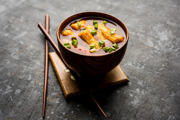 Baby Corn Manchurian with gravy - popular Indo-chinese recipe. selective focus