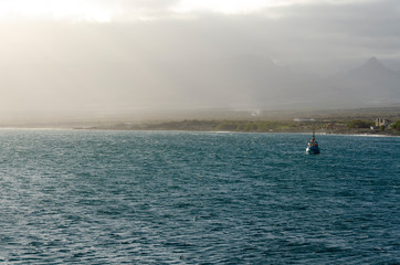 Obraz premium Boat in the ocean near Santo-Antao, Cape Verde