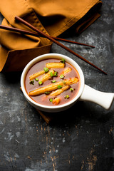 Baby Corn Manchurian with gravy - popular Indo-chinese recipe. selective focus