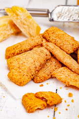 Cheese cookies on wooden rustic table. Close up