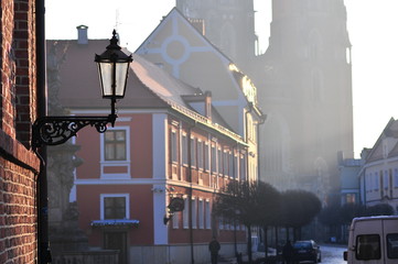 Street lamp lantern in Wroclaw catholic old town Ostrow Tumski. with cathedral in the back