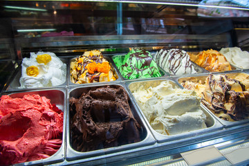 Ice cream in Rome, Italy. Italian gelateria. Ice-cream cafe, show window with sweeties.