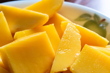 yellow mango on a dish
