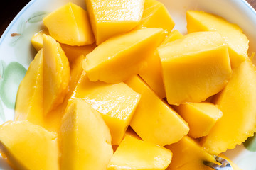 yellow mango on a dish