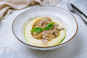Stroganoff on white plate on plate