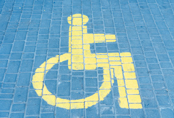 The parking space for disabled people the drawn sign.