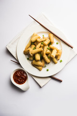 Baby Corn Manchurian dry - popular Indo-chinese starter recipe. selective focus