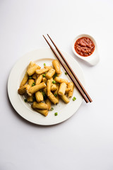 Baby Corn Manchurian dry - popular Indo-chinese starter recipe. selective focus
