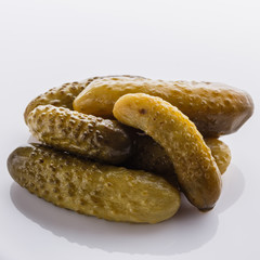 pickled vegetables on a white acrylic background