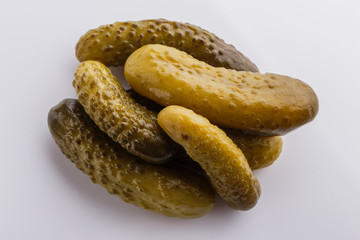 pickled vegetables on a white acrylic background