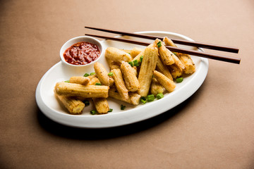 Baby Corn Manchurian dry - popular Indo-chinese starter recipe. selective focus