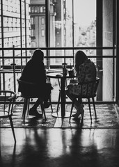 Fototapeta na wymiar Two women at a cafe
