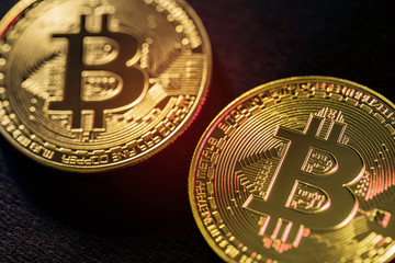Fototapeta na wymiar Focus on blockchain, on two bitcoin crypto currencies up very close