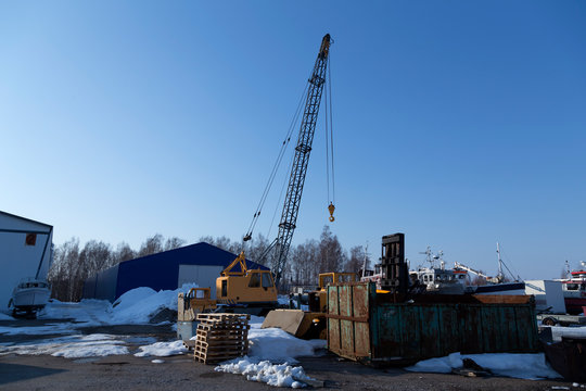 Crane and pallets