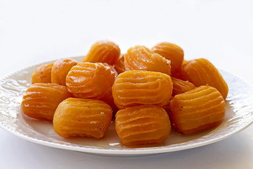 White plate tulumba dessert