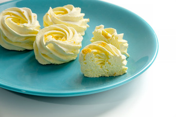 Homemade zephyr or marshmallow in blue plate