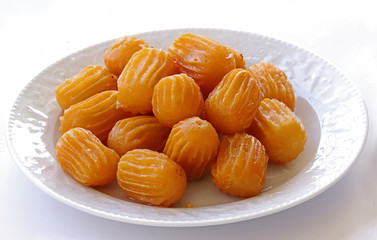 White plate tulumba dessert