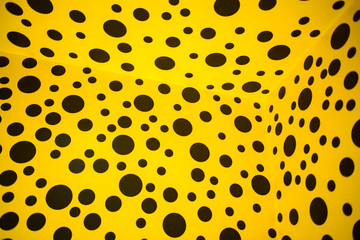 Yellow abstract dotted background with black circle holes spots