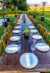 Fototapeta premium Table settings on a Lawn