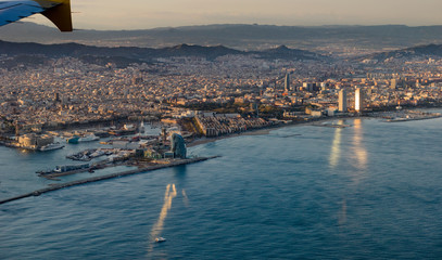 Barcelona skyline during sunset from Helicopter © Lluis Ballbe