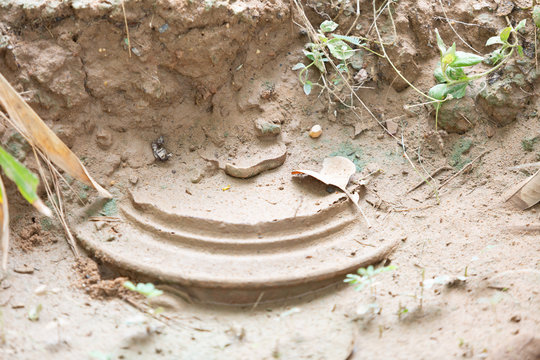 anti tank mine half buried