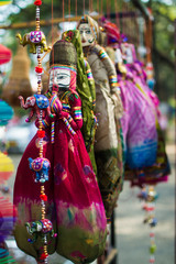 Fototapeta na wymiar Rajasthani dolls for sale in fort Kochi market
