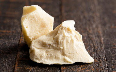 Chunks of Raw Organic Cocoa Butter on a Table