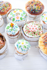 Easter cakes on a white wooden background